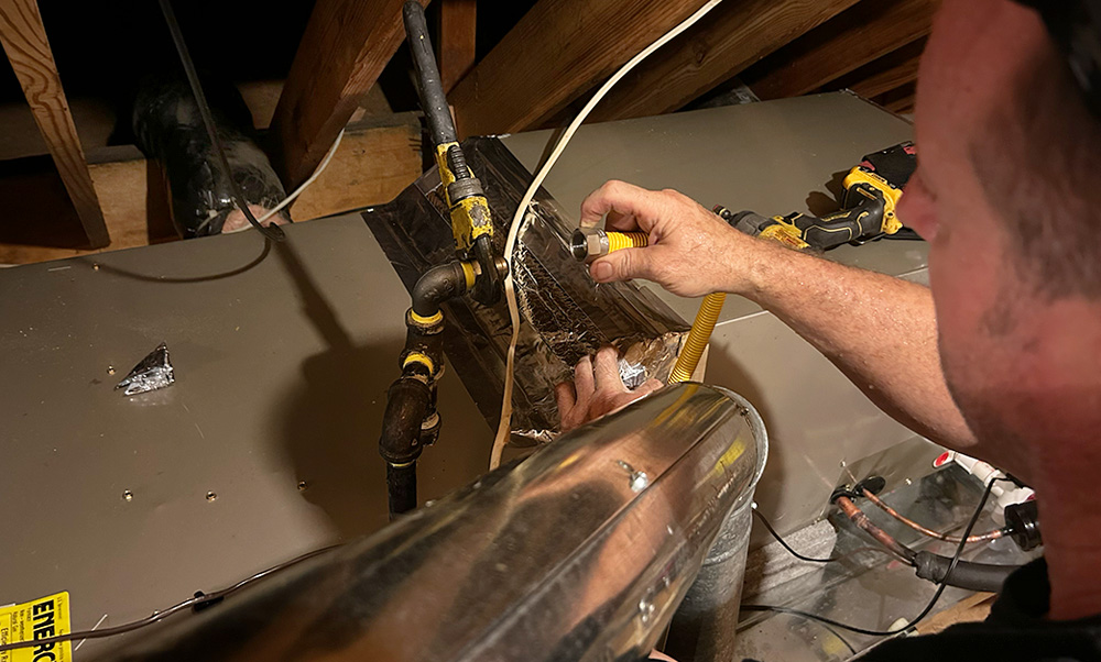 Jaunsee working in an attic